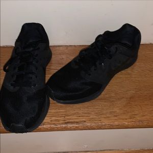 Black nike running shoes